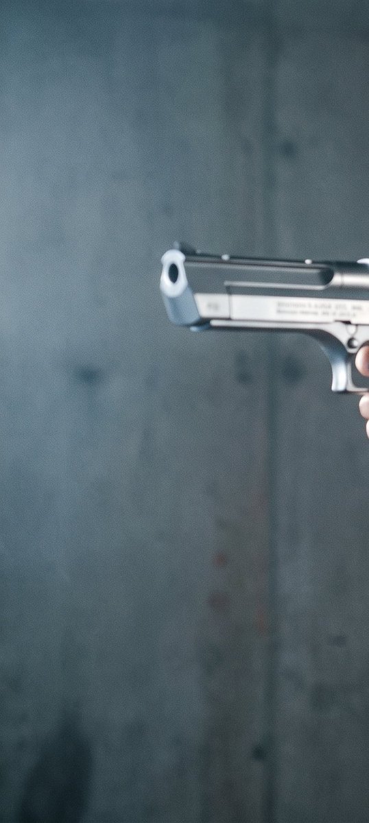 Theme:
1990s Noir-Action Cinema

Subject:
An athletic adult woman in her early thirties with a class — AI image prompt — Nano Banana Pro