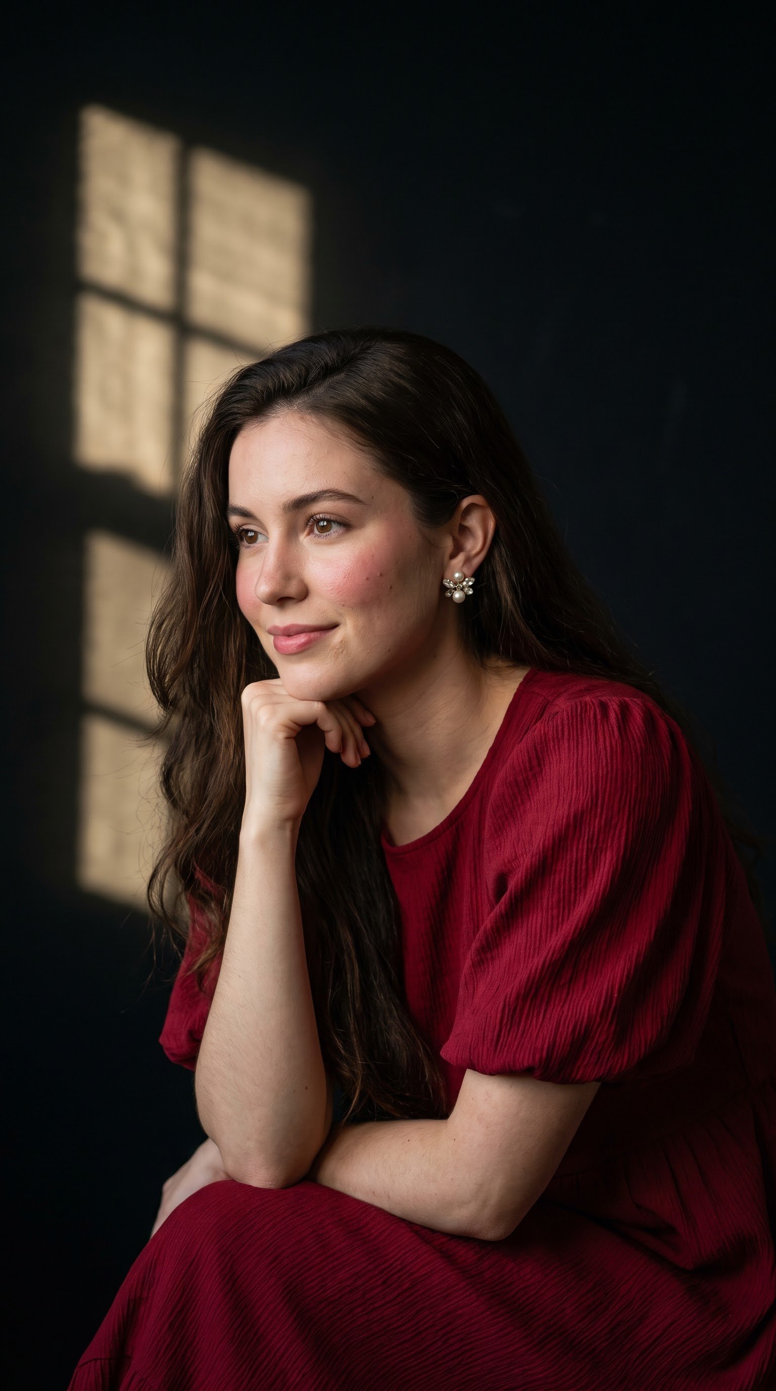 Cinematic portrait of a young woman with long, silky dark brown hair, sitting and resting her chin o — AI image prompt — Nano Banana Pro